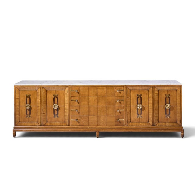 Renzo Rutili for Johnson Furniture Mid Century Walnut, Brass and Marble Credenza This credenza measures: 100.75 wide x...