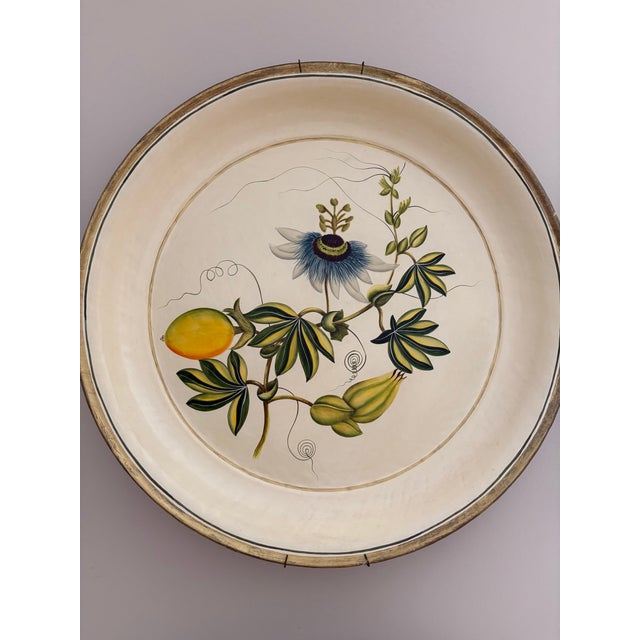Pair of substantial vintage round decorative trays featuring beautiful hand painted botanical and fruit motifs. They have...