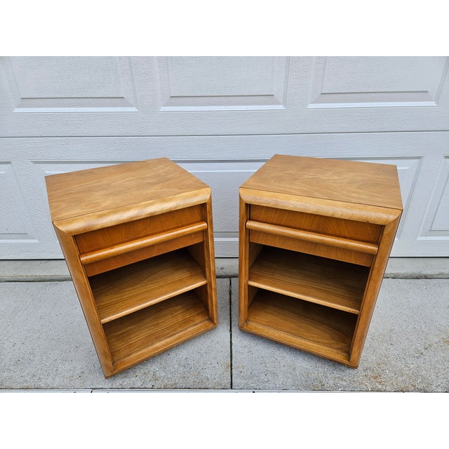Story time! This pair of walnut one drawer nightstands was acquired out of home full of Widdicomb pieces designed by...