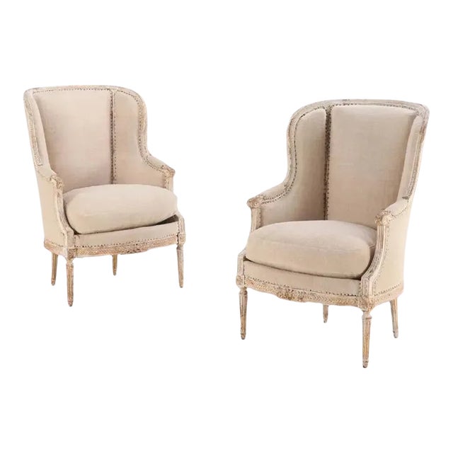 A Pair of French Louis XVI Style Upholstered and Painted Bergere Chairs, C 1900. For Sale