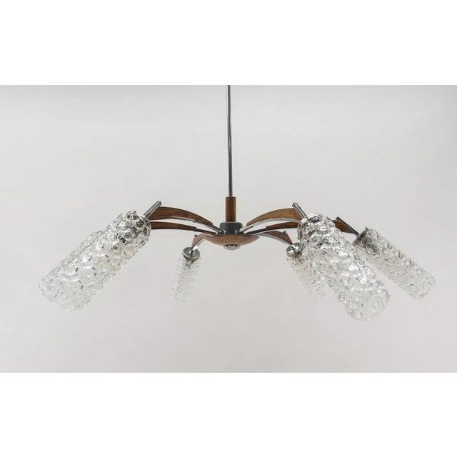 1960s. The lamp is executed with 6 x E14 Edison screw fit bulbs. It is wired and in working condition. It runs both on 110...