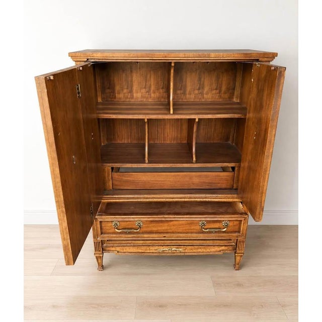 Solid Walnut Vintage Drexel Heritage Francesca Armoire, in fantastic condition. Measures 58” high, 42” wide, and 19” deep,...