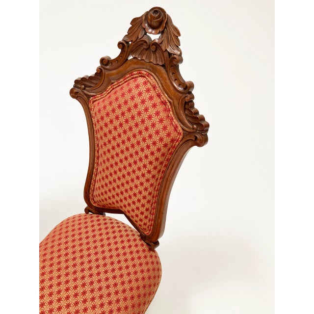 This stunning pair of Victorian hand-carved walnut ladies chairs are nothing short of breathtaking when you see them in an...