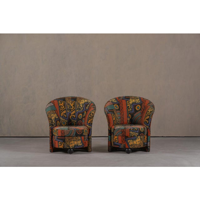 This pair of Postmodern armchairs was produced in Germany during the 1980's and reflects the bold use of color, pattern,...