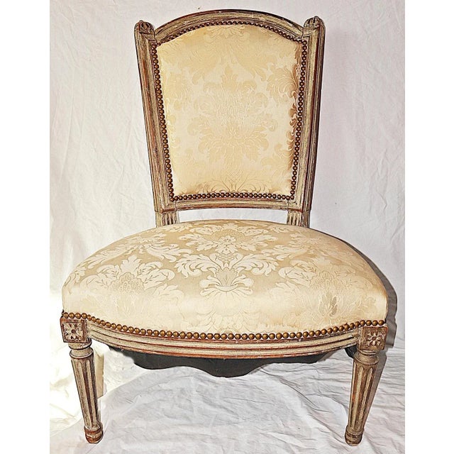 A rare treat, original paint finish on this 19c French low seated vanity chair in Louis XVI style, genuine wear all over...