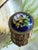 Vintage Estée Lauder Palazzo solid perfume compact featuring a domed cobalt blue enamel lid accented with a colorful...