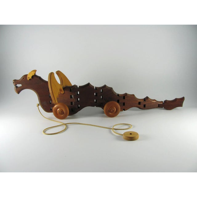 Superb crafts(wo)manship Mechanically perfect—glides along a wood floor with ease while the articulated hinges move around...