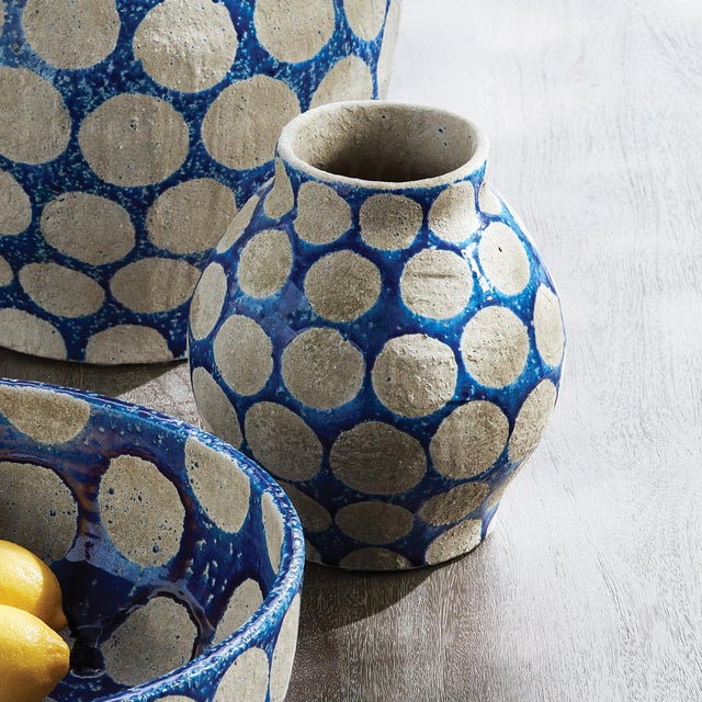 In a nod to midcentury pottery, this fun, fashion statement makes a memorable centerpiece. Fill with faux blooms, or leave...