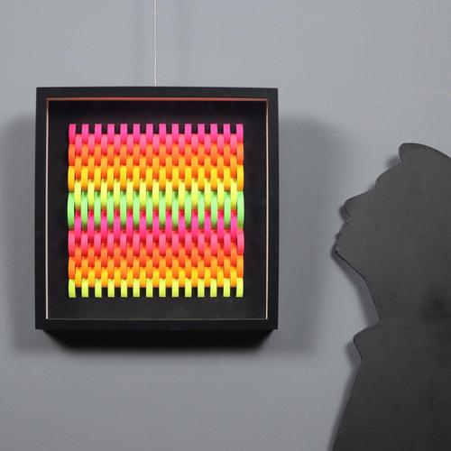 Fluorescent paper on black cardboard. The back features a label from the artist's studio with the title, , and date of the...