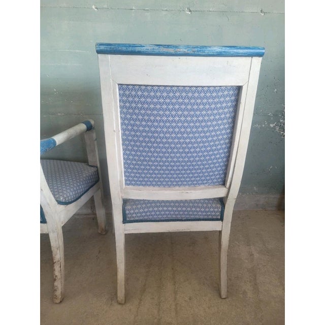 Pair of antique lacquered/shabby chic armchairs, Empire style. Reupholstered with fabric that matches the colors of the...