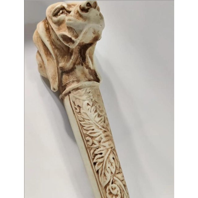 For your consideration. . . A figural vintage dog head magnifying glass. The magnifying glass features a long faux ivory...