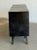 W84 D20 H33.75 Large 7ft credenza featuring a black leather wrapped case with four rosewood door panels. The solid brass...