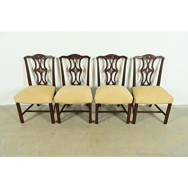 A gorgeous set of four Georgian or Chippendale style dining chairs In the manner of Baker Furniture USA, Circa 1980s...