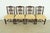 A gorgeous set of four Georgian or Chippendale style dining chairs In the manner of Baker Furniture USA, Circa 1980s...