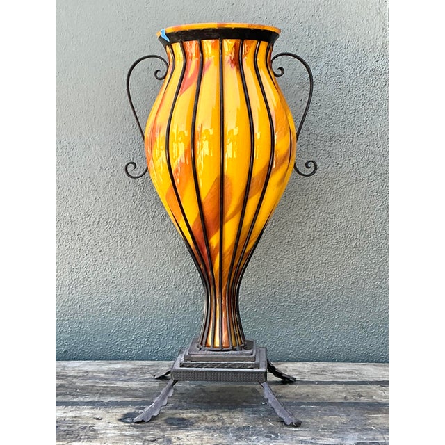 This magnificent vintage urn is a testament to the dramatic flair of 1970s Mediterranean-inspired design. The piece...