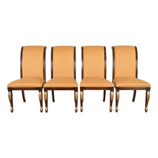 Baker Furniture Style Regency Carved Mahogany and Gold Gilt Dining Chairs, Set of Four For Sale