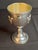 This vintage Israeli sterling silver Kiddush cup goblet (becher) features traditional Jewish ritual motifs. Hand-finished...