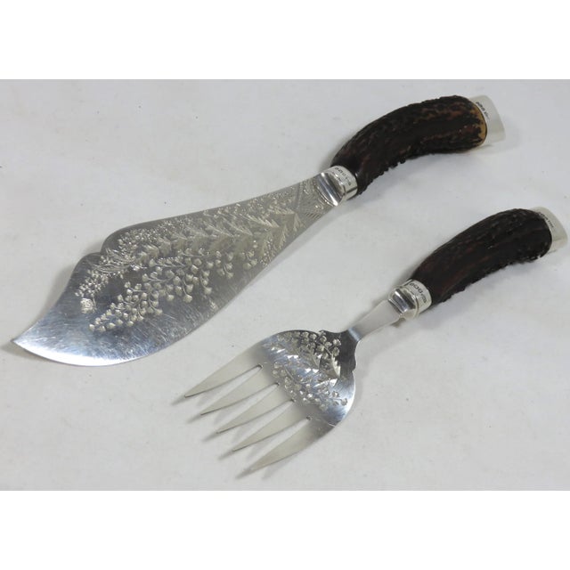 A Fine Quality Antique English Fish Serving Set. The Large Scale Genuine Stag Horn - Antler Handles are Mounted with...