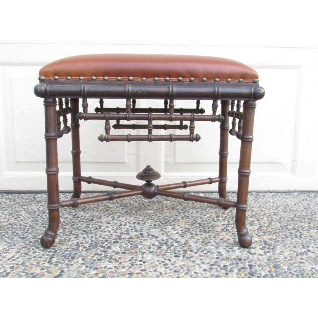 Antique French faux bamboo stool, c.1920 Rectangular in shape, newly upholstered in soft brown leather with nail head...