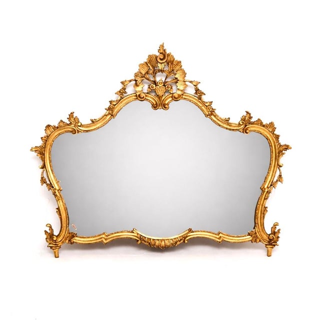 An absolutely stunning antique Italian gilt wood mirror, dating from around the 1930’s period. It is of superb quality, it...
