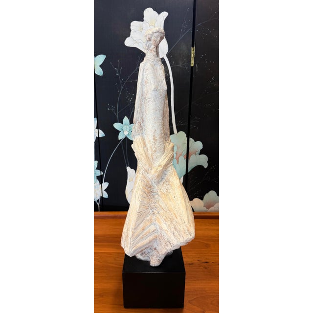 Rare Austin Productions Brutalist/MCM tall sculpture that features a woman and makes a bold statement in any room it...