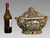 A large Chinese Rose Medallion (Famille Rose) hand painted porcelain covered oval soup tureen. Rich enamel detailing, all...