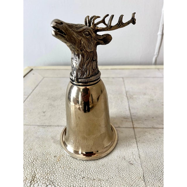 Gucci signed Elk Stirrup cup. A unique cup in that it can rest on the antlers as. a cup or be displayed turned over with...