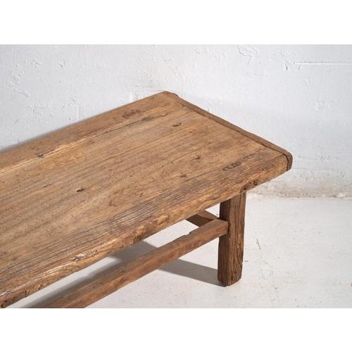 Antique low table in pine wood, traditional chinese furniture originating from northern china and dated circa 1930....