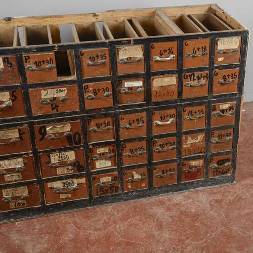 This authentic woodworking workshop chest of drawers is a unique piece of industrial modernism, revealing decades of...