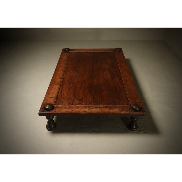 Antique monumental daybed from Rajasthan area, dating to the 19th century. Crafted from solid tropical hardwood, this...