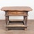 19th century Swedish Baroque side table, crafted in pine and retaining its original painted finish. The base shows...