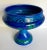 Here is a stunning bowl in vibrant blues and greens made in Italy in the mid-century, marked on the bottom. The shape is...