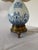 An elegant 19th-century (1850-1880) table lamp, a refined example of the french neoclassical style. The pear-shaped base...