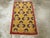 This Mid-20th century Turkish Art Deco throw rug, measuring 2' 0" x 3' 3", embodies the bold yet minimalist aesthetic of...