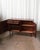 A refined example of Danish Modern cabinetry by Omann Jun, executed in richly grained rosewood during the height of...