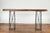 A unique contemporary console table made with a Javanese reclaimed wood top and two metal suspension bases from Thailand,...