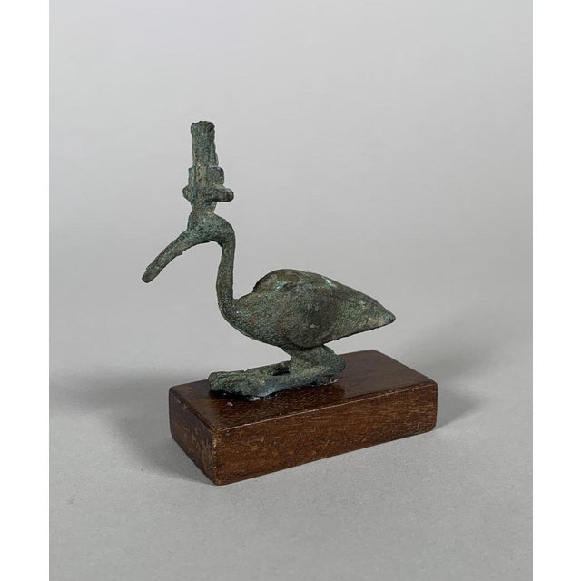 Statuette of THOT-IBIS Bronze with green patina Egypt Ptolemaic period 332–30 BC. For Sale