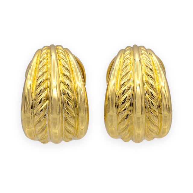 These vintage David Yurman shrimp earrings are crafted in solid 18K yellow gold and feature the sculpted cable design that...