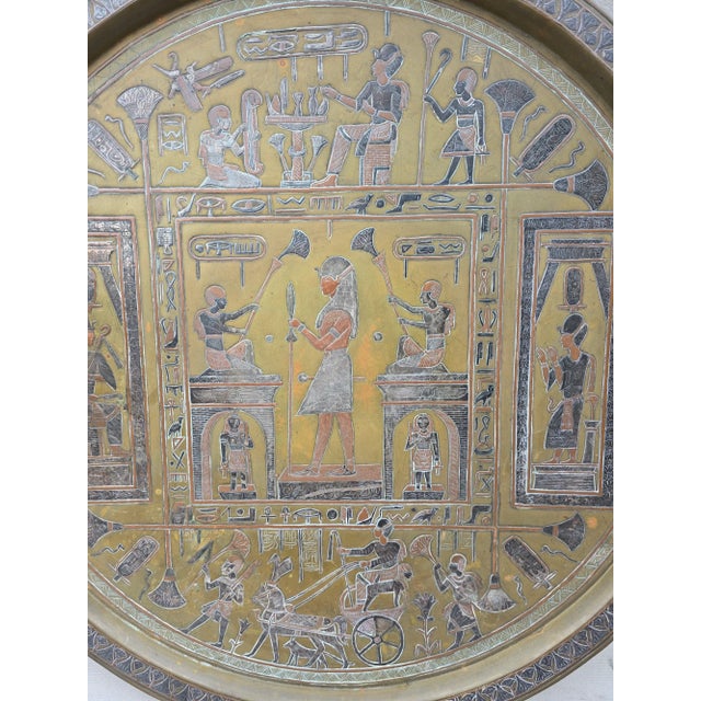 This is an Egyptian Revival mixed metal tray. This could be used as a serving tray, a table top or a wall hanging. This...