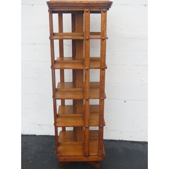 This brilliant Bookcase is made of wood, oak, and solid tiger oak. The bookcase features a square central pillar that...