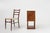 An exquisite Art Deco nightstand on graceful high legs in oak with carrara marble top. Crafted in France in the 1930s in...