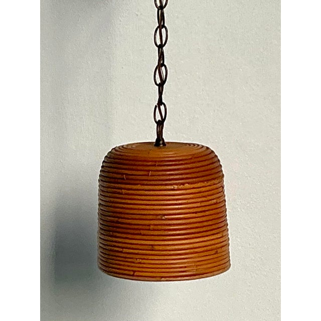 This charming vintage pendant light is a beautiful example of Organic Modern design, showcasing the intricate texture of...