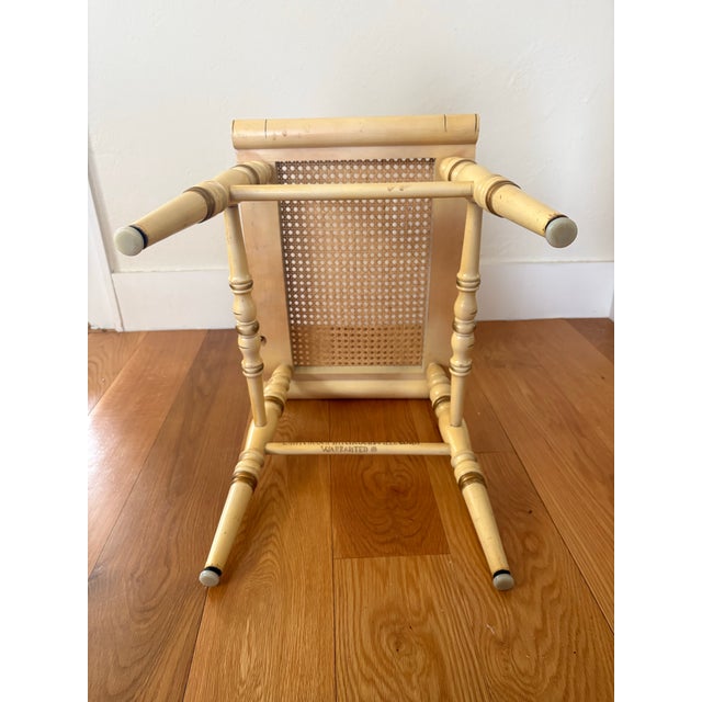 Original Hitchcock Bench featuring hand stencil motifs, turned legs and caned seat. This bench has the Hitchcock name...