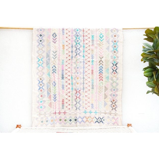 Discover the timeless artistry of this hand-stitched cotton Kantha throw. Measuring a versatile 57 inches by 87 inches,...