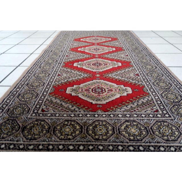 Vintage German Geometric Rug – Red & Gold Diamond Pattern – 2.3' × 4.6' (1970s) This vintage German geometric rug from the...