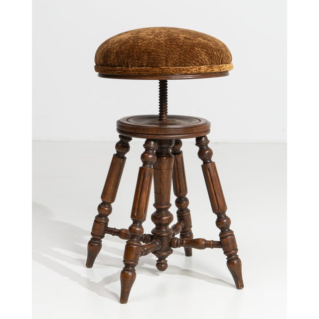 Crafted in France during the opulent reign of Napoleon III, this exceptional piano stool embodies the era's signature...