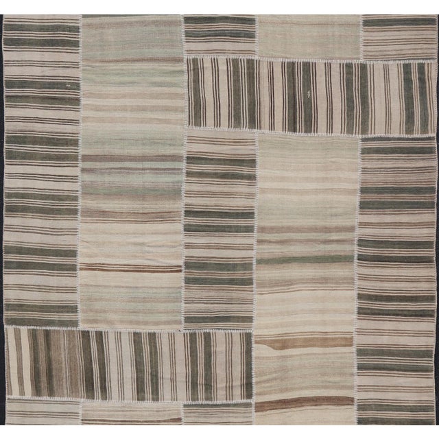 Large Vintage Turkish paneled Kilim Rug With Earthy Tones and Striped Design Measures: 12' x 15'2 This large vintage...