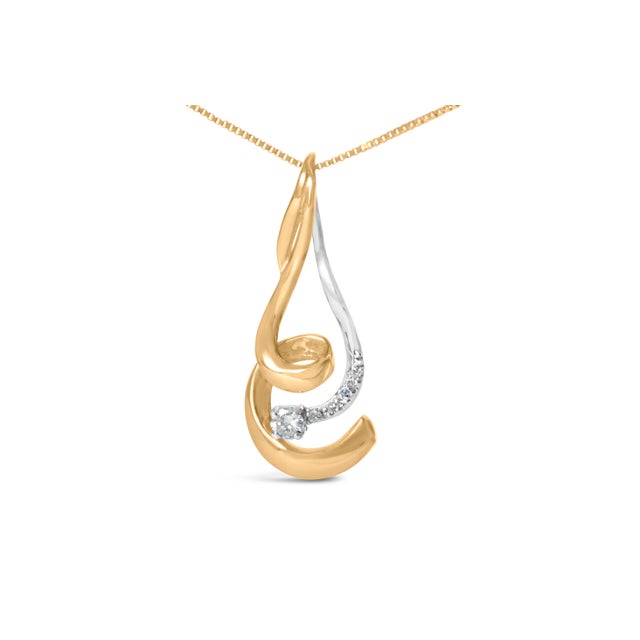 A swirl of white and yellow gold creates a stunning spiral effect, making this pendant a true standout. With a scattering...