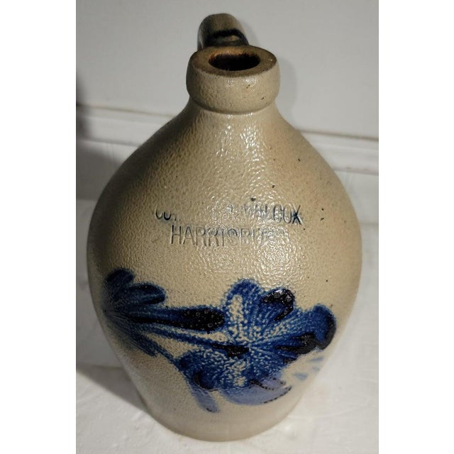 This 19thc hand crafted decorated stoneware jug is in fine condition and has a floral decoration.This is a real collectors...