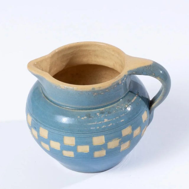 Antique mochawate checker board cream pitcher made in Austria in the late 19th century.